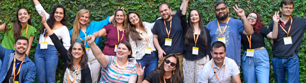 A group of Single Cell Genomics course participants and instructors. The participants represent eight Latin American countries. The group are standing in front of tree, posing for a training group photo, in Brazil.